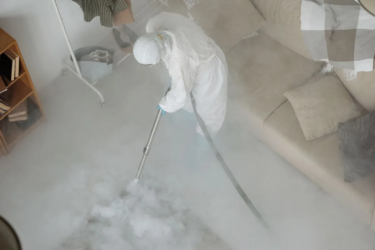 Biohazard cleanup technician in protective equipment, Juniata Park, Philadelphia, PA